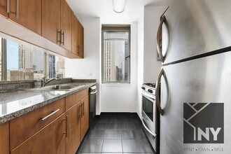 2 Maiden Ln, Unit 3407 in New York, NY - Foto de edificio - Building Photo