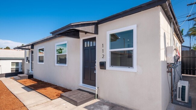 property at 114 E 5th St