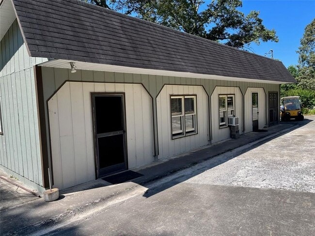 property at 7128 Dawsonville Hwy