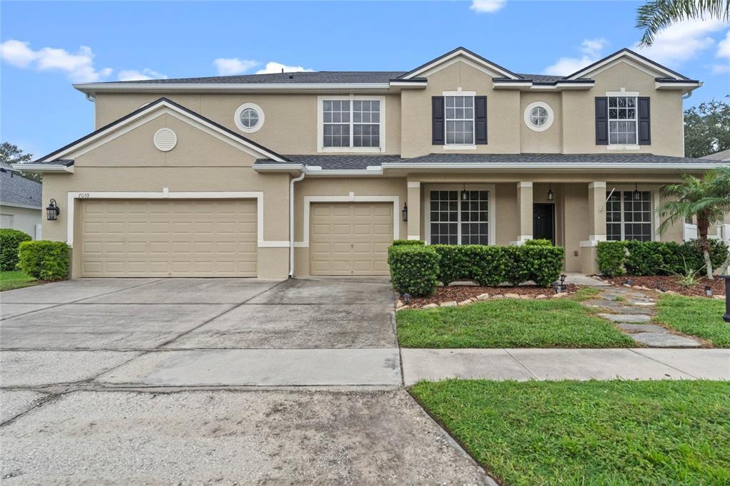 7059 Winding Lake Cir in Oviedo, FL - Building Photo