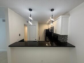 3402 Gardens E Dr in Palm Beach Gardens, FL - Building Photo - Building Photo