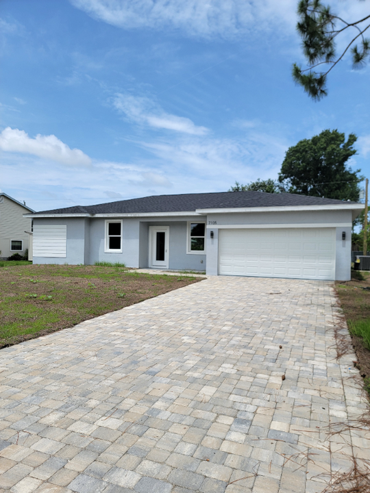 7105 Happiness St in Port Charlotte, FL - Building Photo