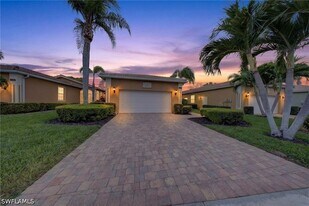 15257 Cortona Way in Naples, FL - Building Photo