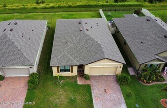 2073 Farmhouse Rd SE, Unit 5 in Palm Bay, FL - Building Photo - Building Photo