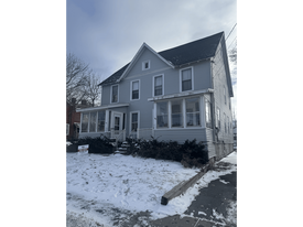 146-148 E Main St in Watertown, NY - Building Photo