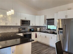 5028 S Obispo Cir in La Belle, FL - Building Photo - Building Photo