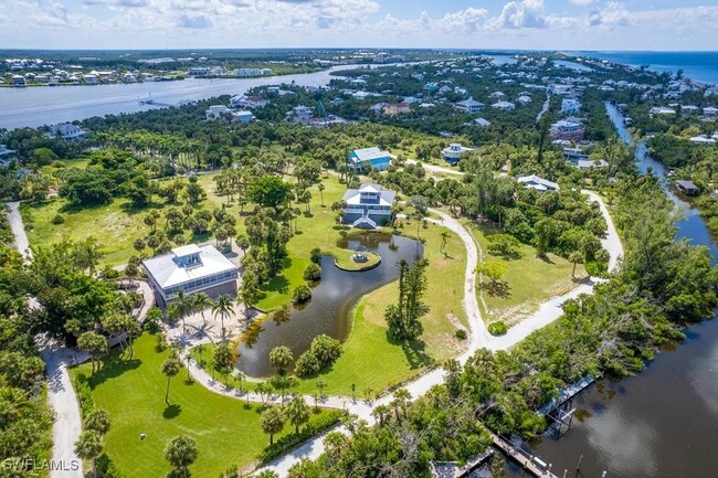 10440 Yacht Basin Dr in Placida, FL - Building Photo - Building Photo