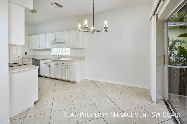 10735 Maui Cir in Estero, FL - Building Photo - Building Photo