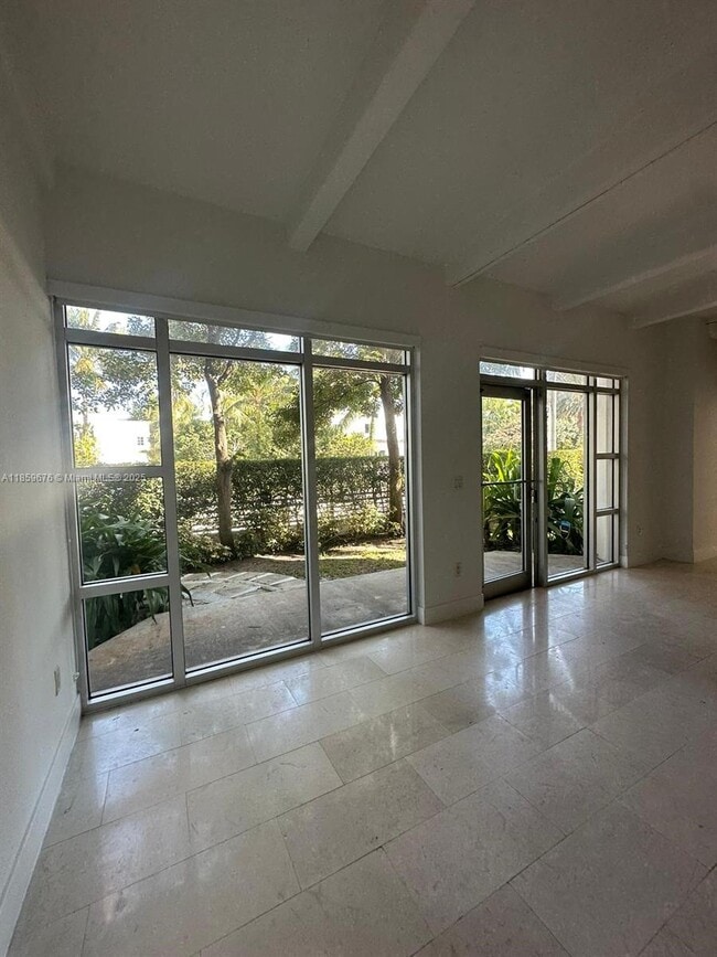 property at 7728 Collins Ave