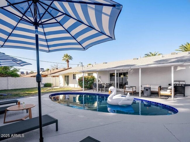 property at 8335 E Hubbell St