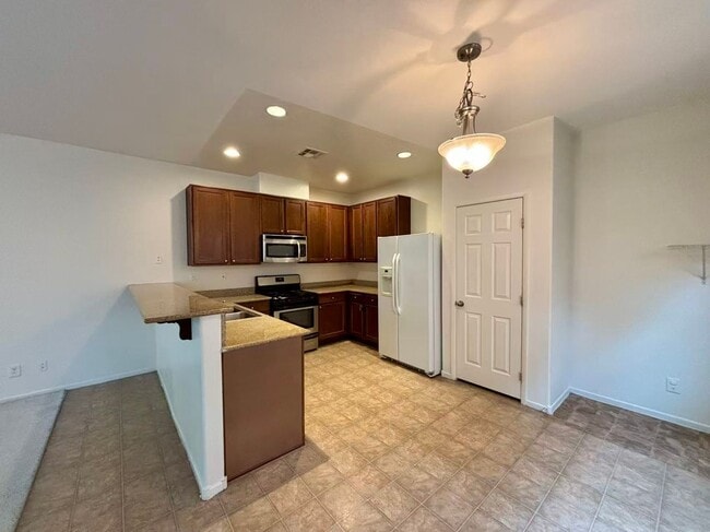 7736 Pista Way in Las Vegas, NV - Building Photo - Building Photo