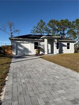 1037 Macy St E in Lehigh Acres, FL - Building Photo