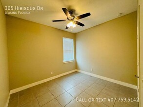 305 Hibiscus Dr in Poinciana, FL - Building Photo - Building Photo