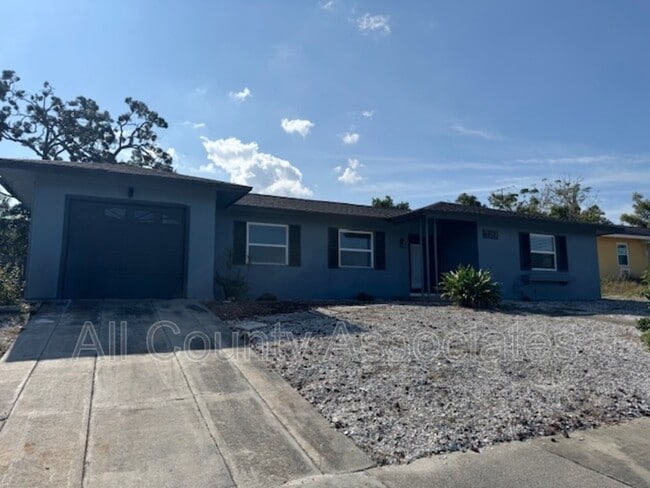 property at 7154 Holiday Dr