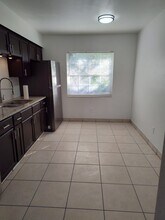 6706 S Kissimmee St, Unit 6706.5 Kissimmee st. FL in Tampa, FL - Foto de edificio - Building Photo