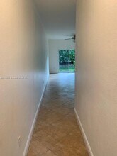 5600 NW 114th Pl-Unit -106 in Doral, FL - Building Photo - Building Photo