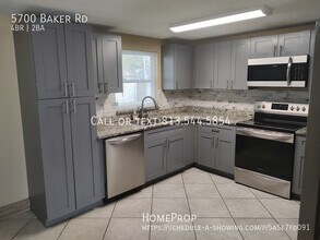 5700 Baker Rd in New Port Richey, FL - Building Photo - Building Photo