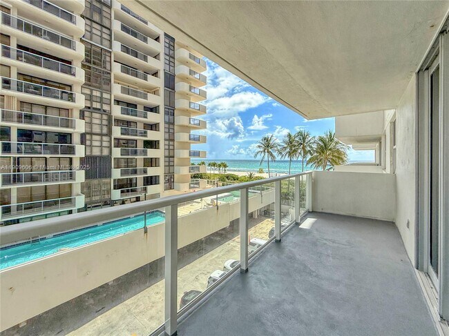 property at 5701 Collins Ave