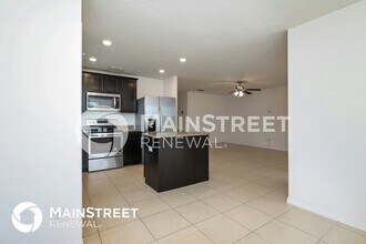 1499 Swan Lake Cir in Dundee, FL - Foto de edificio - Building Photo