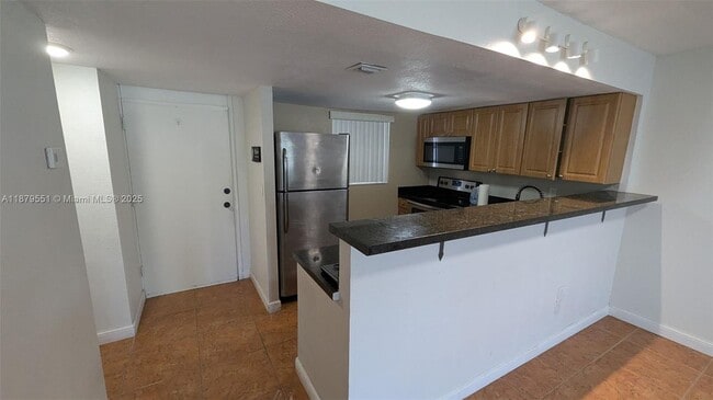 property at 15600 NW 7th Ave