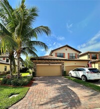 28050 Cookstown Ct in Bonita Springs, FL - Foto de edificio - Building Photo