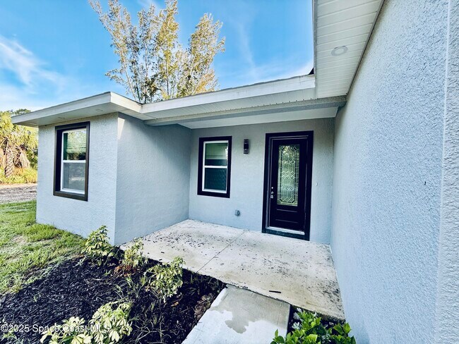 475 La Coco St SW in Palm Bay, FL - Building Photo - Building Photo