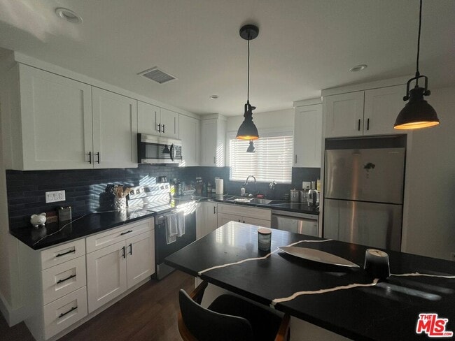 property at 8302 Capps Ave