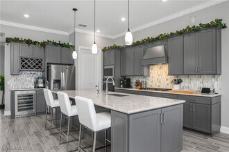 21064 Hallandale Dr in Estero, FL - Building Photo - Building Photo