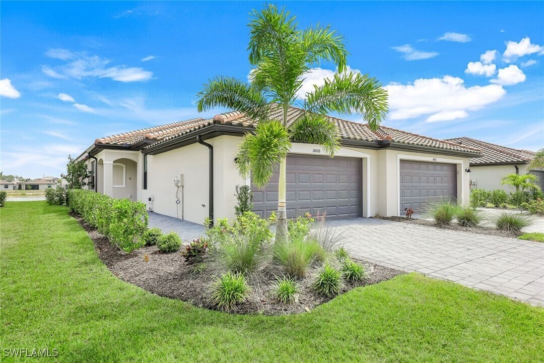 14008 Hunter Oak Dr in Miromar Lakes, FL - Building Photo