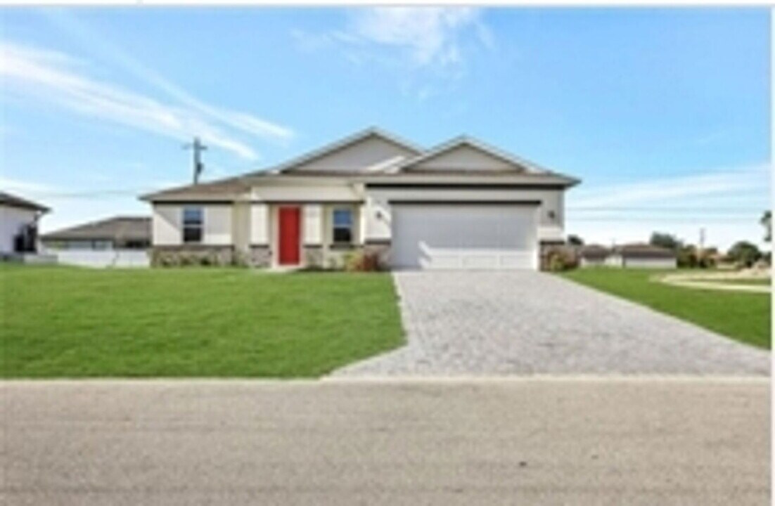 1310 NW Juanita Pl in Cape Coral, FL - Building Photo