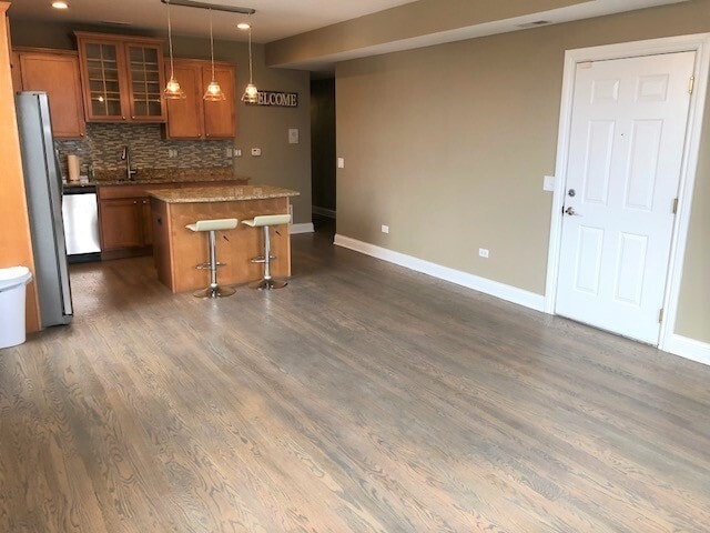 5941 W Corcoran Plz, Unit 3E in Chicago, IL - Building Photo - Building Photo