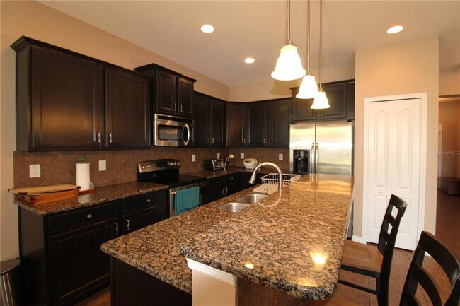 8463 Karpeal Dr in Sarasota, FL - Building Photo - Building Photo