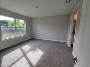 21901 Milan Villas Ln in Estero, FL - Building Photo - Building Photo