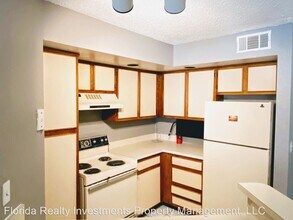 5785 Gatlin Ave-Unit -Unit 715 in Orlando, FL - Building Photo - Building Photo