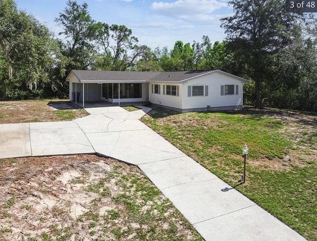 11409 Spring Hill Dr in Spring Hill, FL - Building Photo - Building Photo