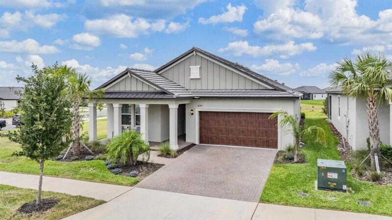 10381 Tupper Cay Dr in San Antonio, FL - Building Photo