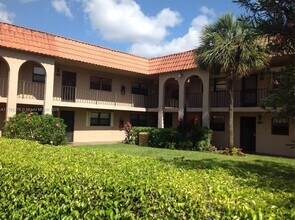 1921 Woolbright Rd in Boynton Beach, FL - Foto de edificio - Building Photo