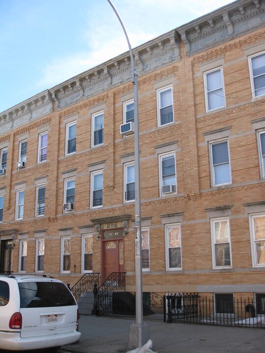 64-30 Madison St in Flushing, NY - Building Photo