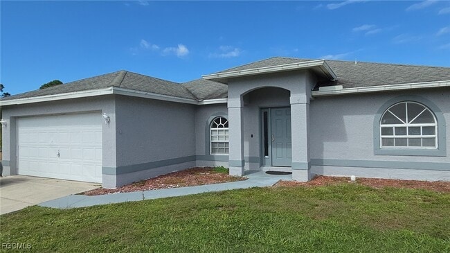 835 Grant Blvd in Lehigh Acres, FL - Building Photo - Building Photo