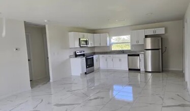 1135 Chiefland St E in Lehigh Acres, FL - Building Photo - Building Photo
