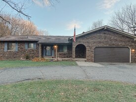 59415 Grand River Ave in New Hudson, MI - Building Photo