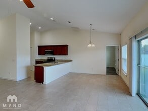 9 Cecilia Way, Unit 101 in Poinciana, FL - Foto de edificio - Building Photo