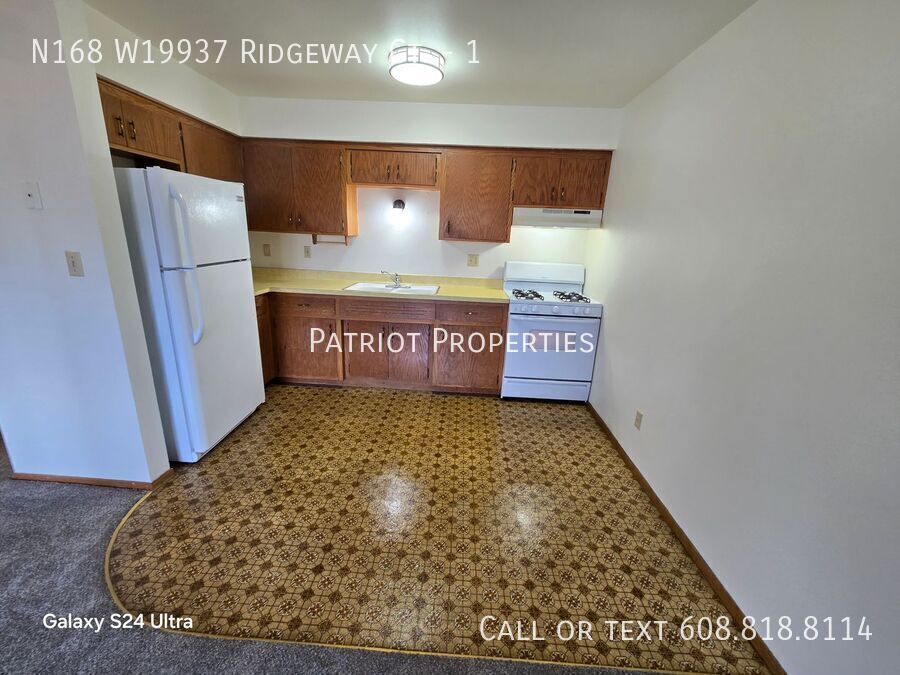 N168W19937 Ridgeway Ct-Unit -1 in Jackson, WI - Building Photo