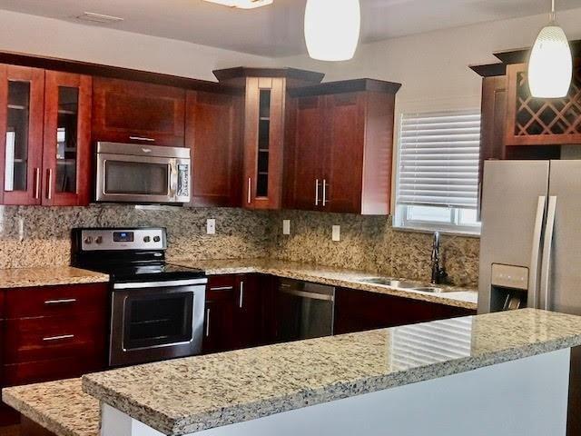 property at 323 SW 11th St