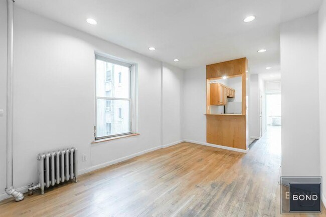 property at 68 E 1st St