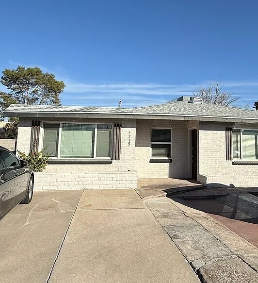 property at 1715 E Miles St