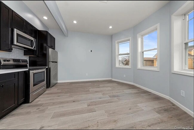 property at 32-17 105th St
