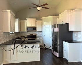 1206 Cooper Dr in Raymore, MO - Building Photo - Building Photo