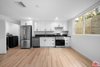 1535-1538 N Kingsley Dr in Los Angeles, CA - Building Photo - Building Photo