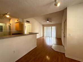 8040 N Nob Hill Rd, Unit 207 in Tamarac, FL - Building Photo - Building Photo